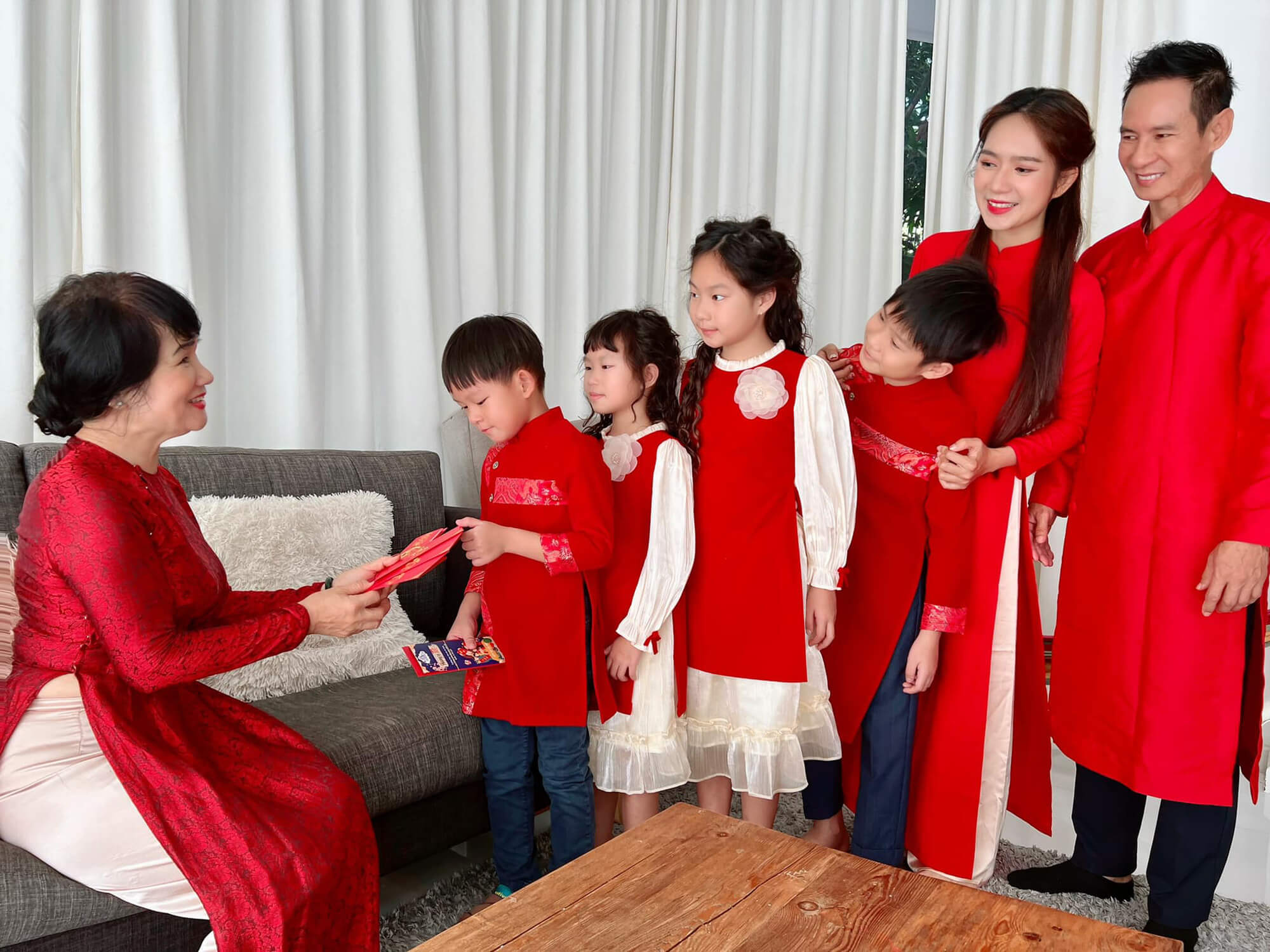 Adults often give red envelopes to children